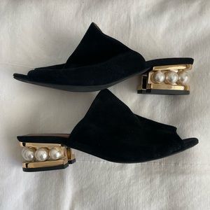 Jeffrey Campbell black pearl heeled sandals with gold trim.